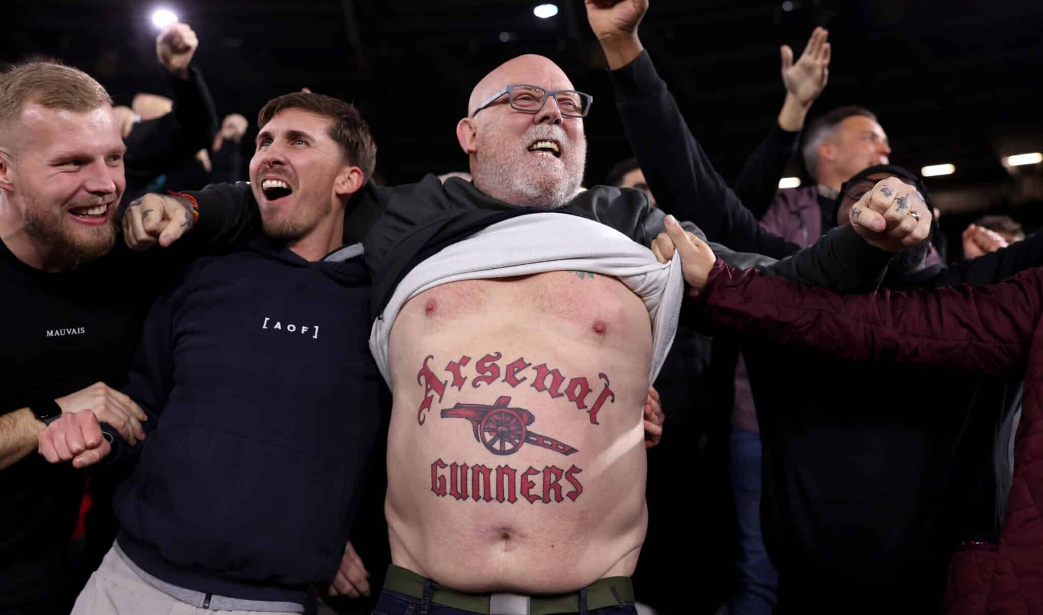 A fan of Arsenal, who has a tattoo on his stomach which reads 