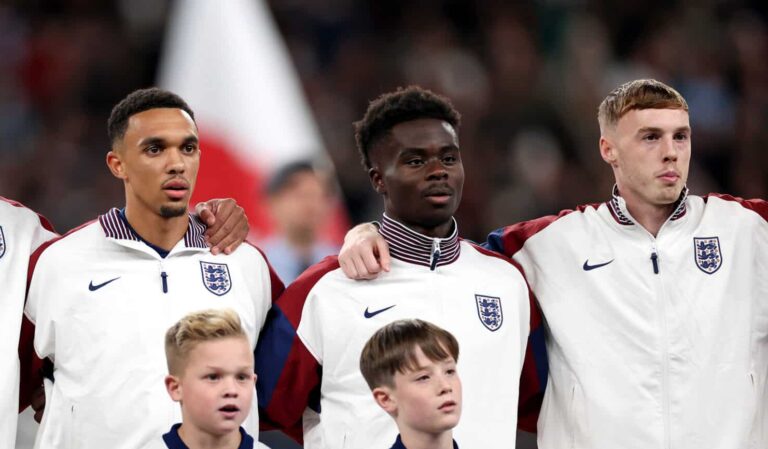 Trent Alexander-Arnold, Bukayo Saka and Cole Palmer of England line up for the national anthem prior to kick-off ahead of the UEFA Nations League 2024/25 League B Group B2 match between England and Greece at Wembley Stadium on October 10, 2024 in London, England.
