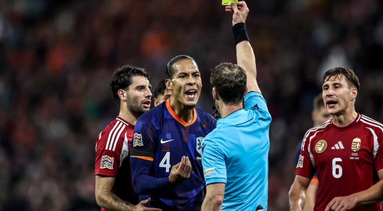 Virgil van Dijk of Netherlands reacts to a yellow card during the UEFA Nations League 2024/25 League A Group A3 match between Hungary and Netherlands at Puskás Aréna on October 11, 2024 in Budapest, Hungary.