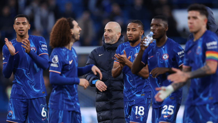 Chelsea players celebrate following a win in the Premier League.
