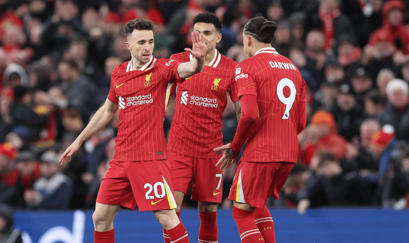 Liverpool forward Diogo Jota celebrates a goal with teammates Darwin Nunez and Luis Diaz in the Premier League match between Southampton and Liverpool.