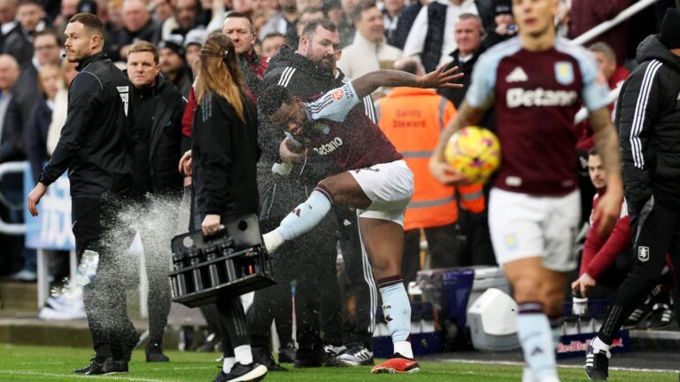 Jhon Duran of Aston Villa kicks a water bottle after receiving a red card after fouling Fabian Schar of Newcastle United (not pictured) during the Premier League match between Newcastle United FC and Aston Villa FC at St James' Park on December 26, 2024 in Newcastle upon Tyne, England.