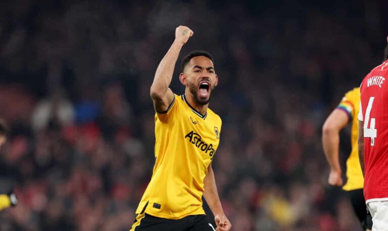 Matheus Cunha of Wolves celebrates after scoring the team's first goal during the Premier League match between Arsenal FC and Wolverhampton Wanderers at Emirates Stadium on December 02, 2023 in London, England.