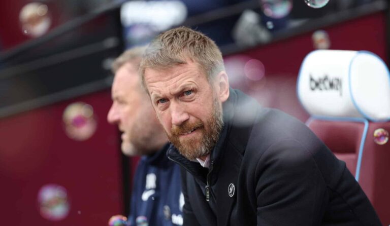 Graham Potter , former manager of West Ham, looks on prior to the Premier League match between West Ham United and Chelsea FC at London Stadium on February 11, 2023 in London, England.