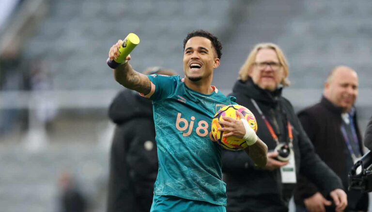 Justin Kluivert of AFC Bournemouth holds the match ball and the Player of the Match award as he acknowledges the fans at the end of the Premier League match between Newcastle United FC and AFC Bournemouth at St James' Park on January 18, 2025 in Newcastle upon Tyne, England.