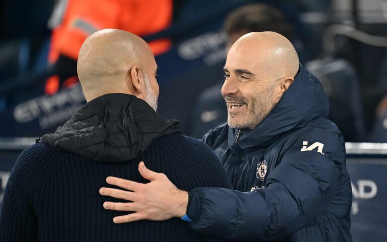 Enzo Maresca, Manager of Chelsea, embraces Pep Guardiola, Manager of Manchester City, prior to the Premier League match between Manchester City FC and Chelsea FC at Etihad Stadium on January 25, 2025 in Manchester, England.