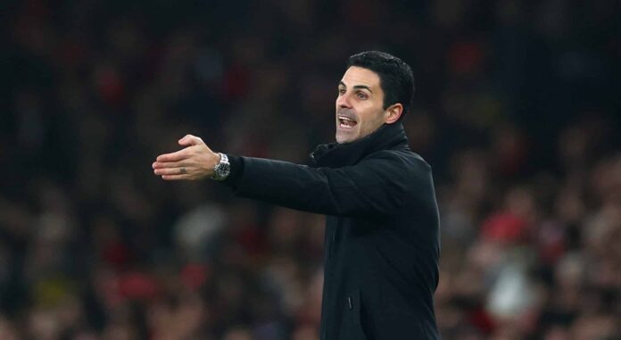 Mikel Arteta, Manager of Arsenal, gives the team instructions during the Premier League match between Arsenal FC and Aston Villa FC at Emirates Stadium on January 18, 2025 in London, England.