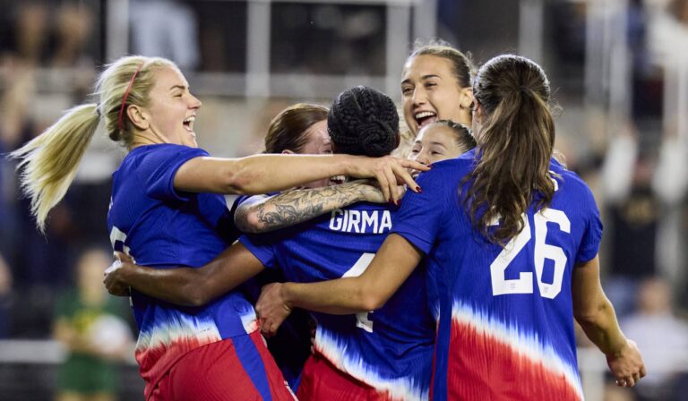 Chelsea transfer target Naomi Girma #4 of United States celebrates with teammates Emma Sears #26, and Hal Hershfelt #19 of United States after scoring the team's first goal during the first half of the international friendly match between United States and Argentina at Lynn Family Stadium on October 30, 2024 in Louisville, Kentucky.