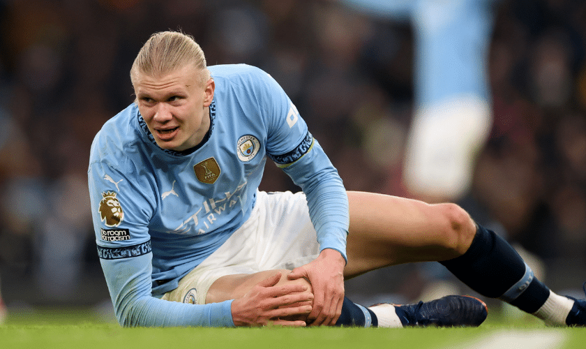 Man City striker Erling Haaland goes down injured during the Premier League match between Manchester City and Newcastle United.