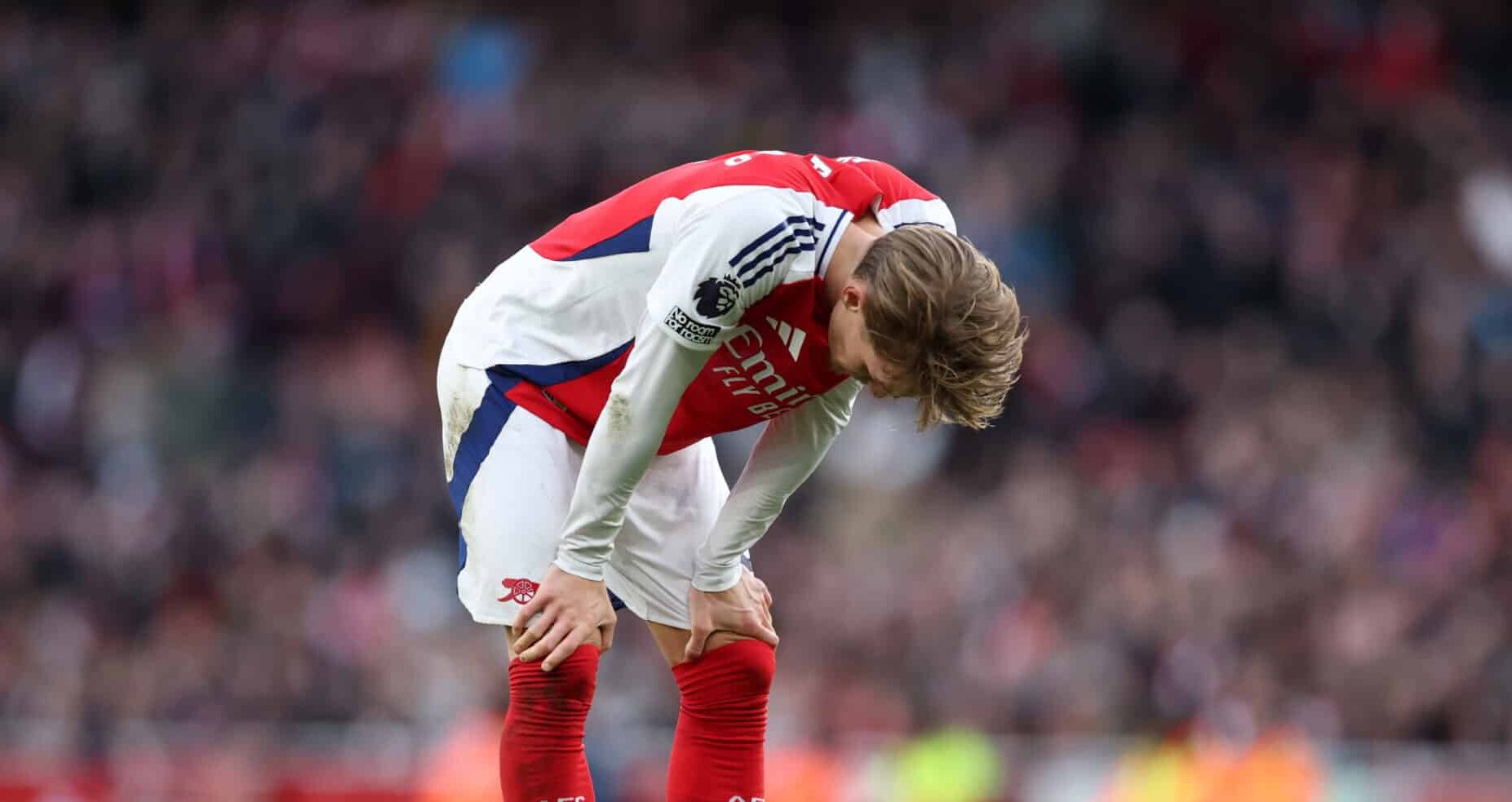 Martin Odegaard of Arsenal looks dejected during the Premier League match between Arsenal FC and West Ham United FC at Emirates Stadium on February 22, 2025 in London, England.