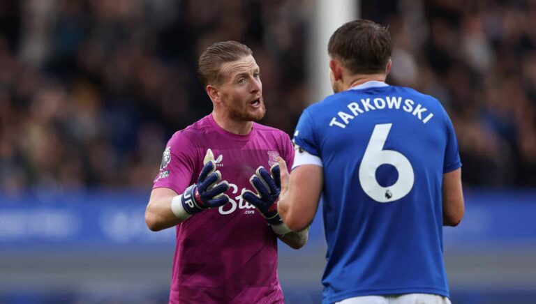 Jordan Pickford and James Tarkowski of Everton talk during the Premier League match between Everton FC and Crystal Palace FC at Goodison Park on September 28, 2024 in Liverpool, England.