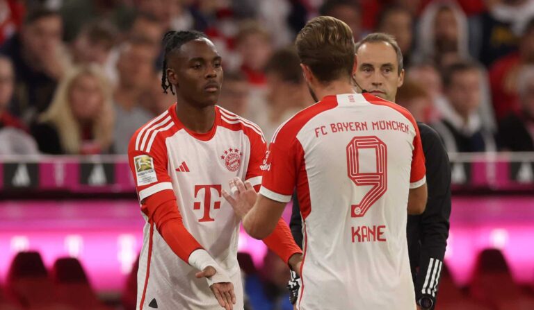 Harry Kane of Bayern Munich is substituted off for teammate Mathys Tel during the Bundesliga match between FC Bayern München and Sport-Club Freiburg at Allianz Arena on October 08, 2023 in Munich, Germany.