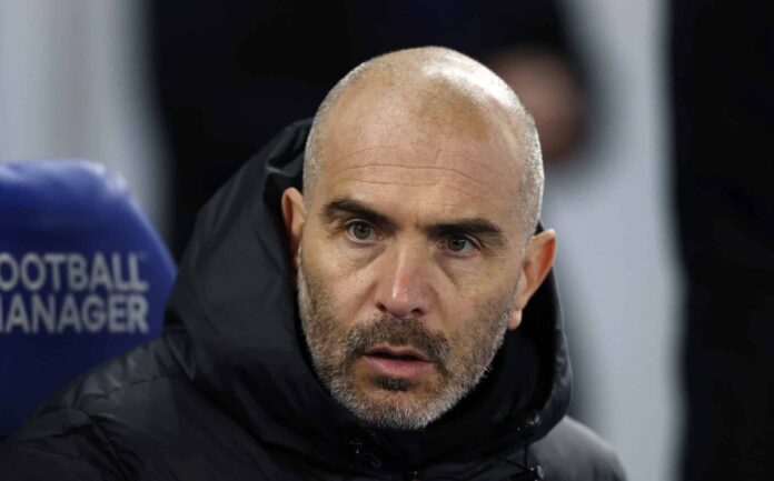 Chelsea manager Enzo Maresca looks on prior to the Premier League match between Brighton & Hove Albion FC and Chelsea FC at Amex Stadium on February 14, 2025 in Brighton, England.