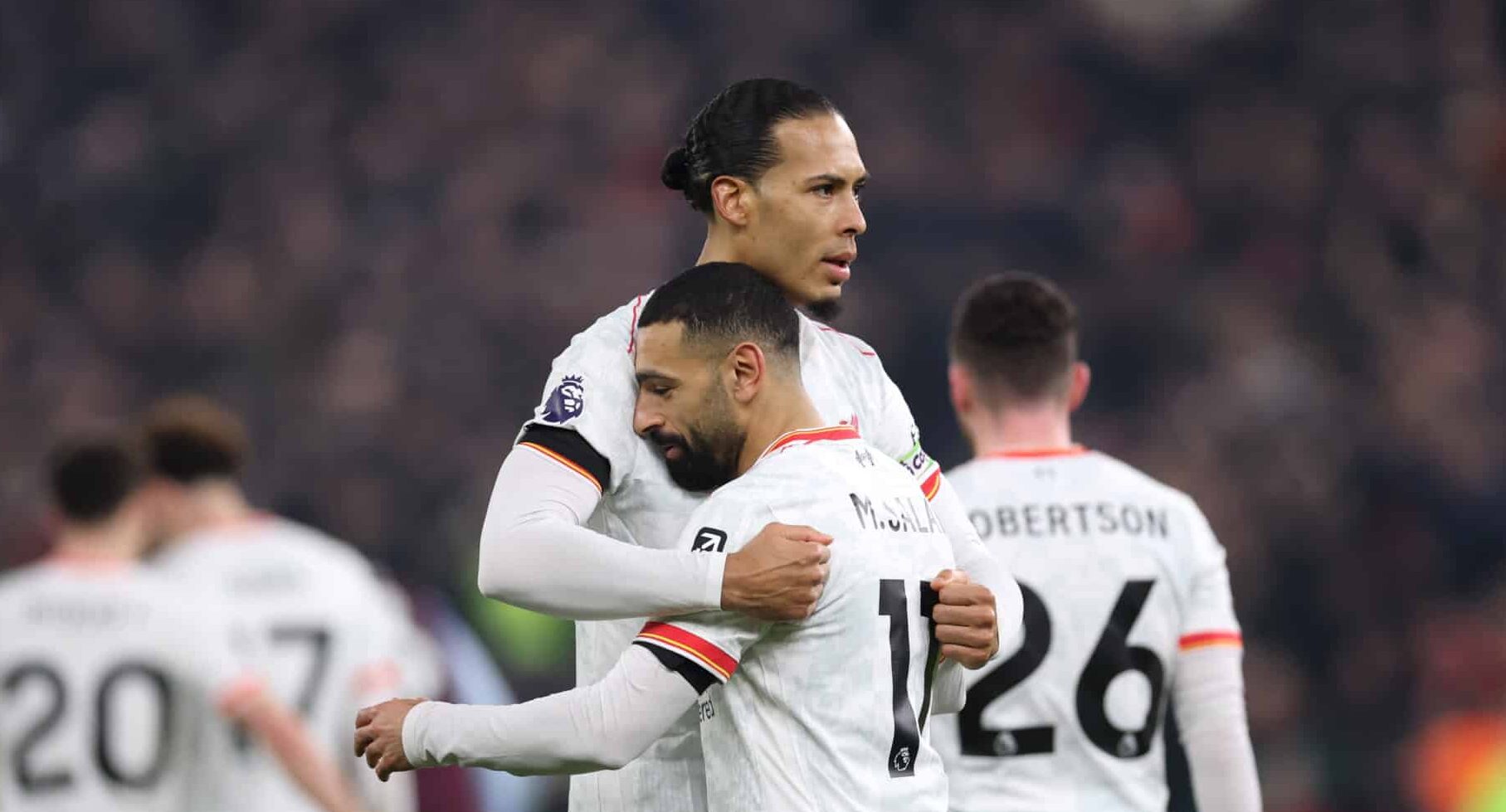 Virgil van Dijk and Mo Salah of Liverpool embrace during the Premier League match between Aston Villa FC and Liverpool FC at Villa Park on February 19, 2025 in Birmingham, England.
