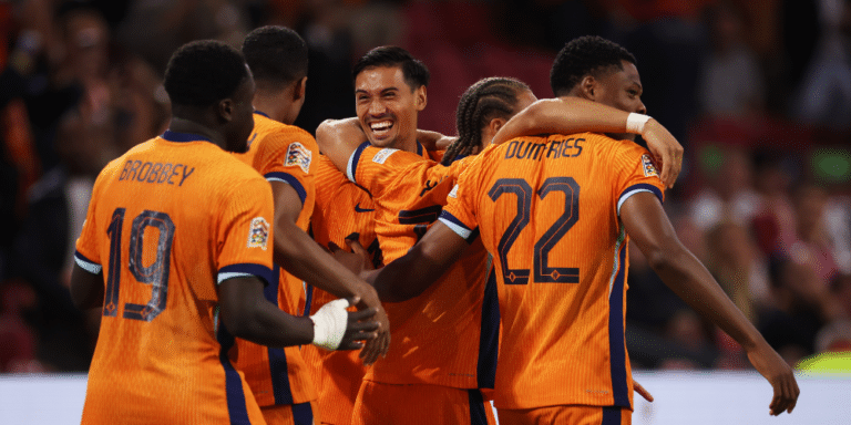 Netherlands players celebrate a goal.