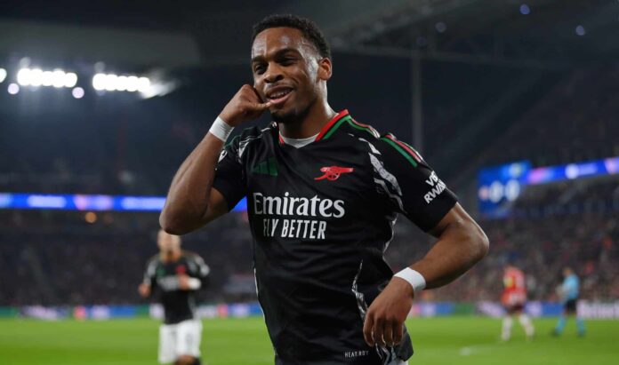 Jurrien Timber of Arsenal celebrates scoring his team's first goal during the UEFA Champions League 2024/25 UEFA Champions League 2024/25 Round of 16 first leg match between PSV and Arsenal FC at PSV Stadion on March 04, 2025 in Eindhoven, Netherlands.