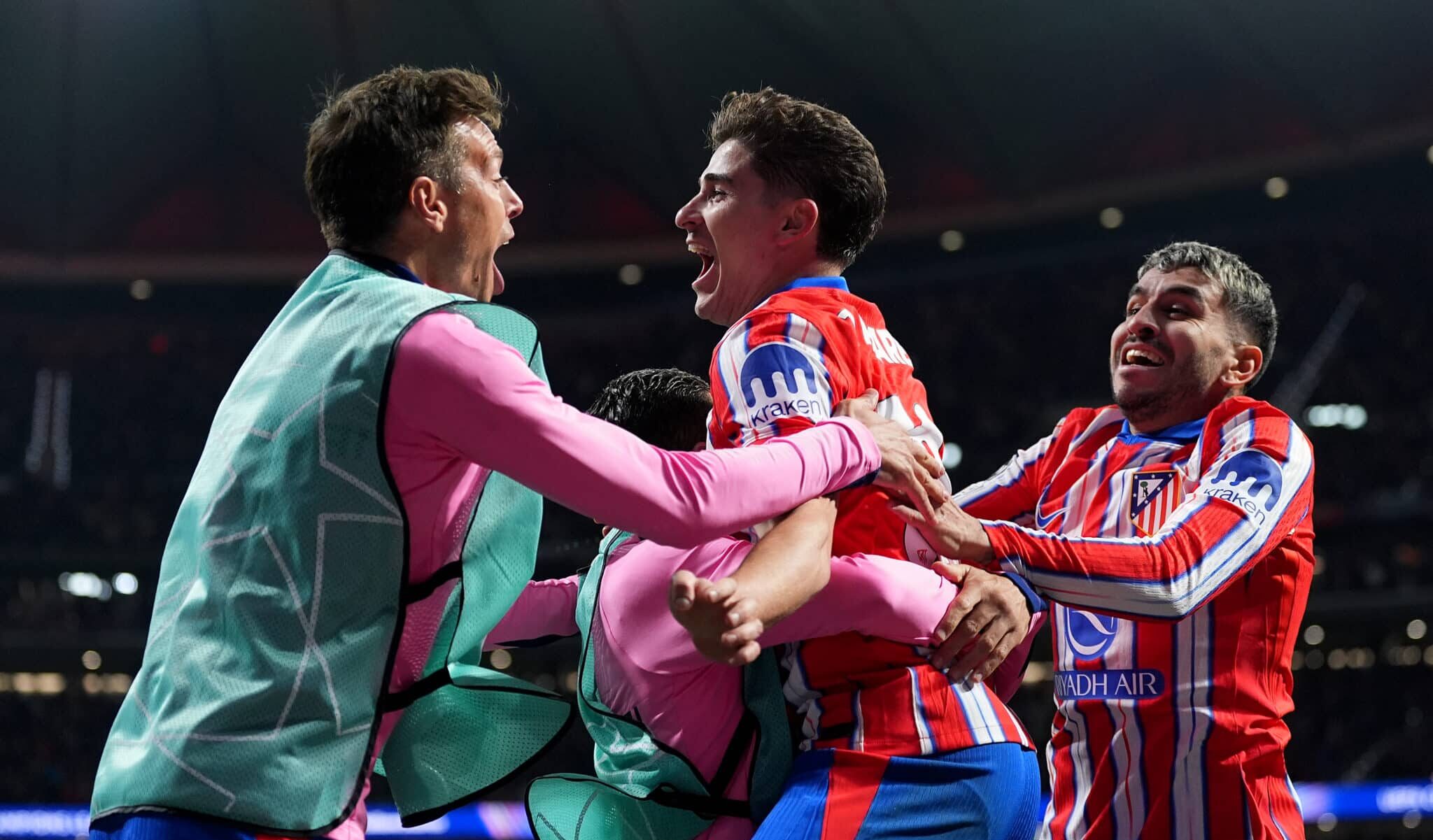 Julian Alvarez of Atletico de Madrid celebrates with his teammates after scoring his team's second goal during the UEFA Champions League 2024/25 League Phase MD7 match between Atletico de Madrid and Bayer 04 Leverkusen at Riyadh Air Metropolitano on January 21, 2025 in Madrid, Spain.