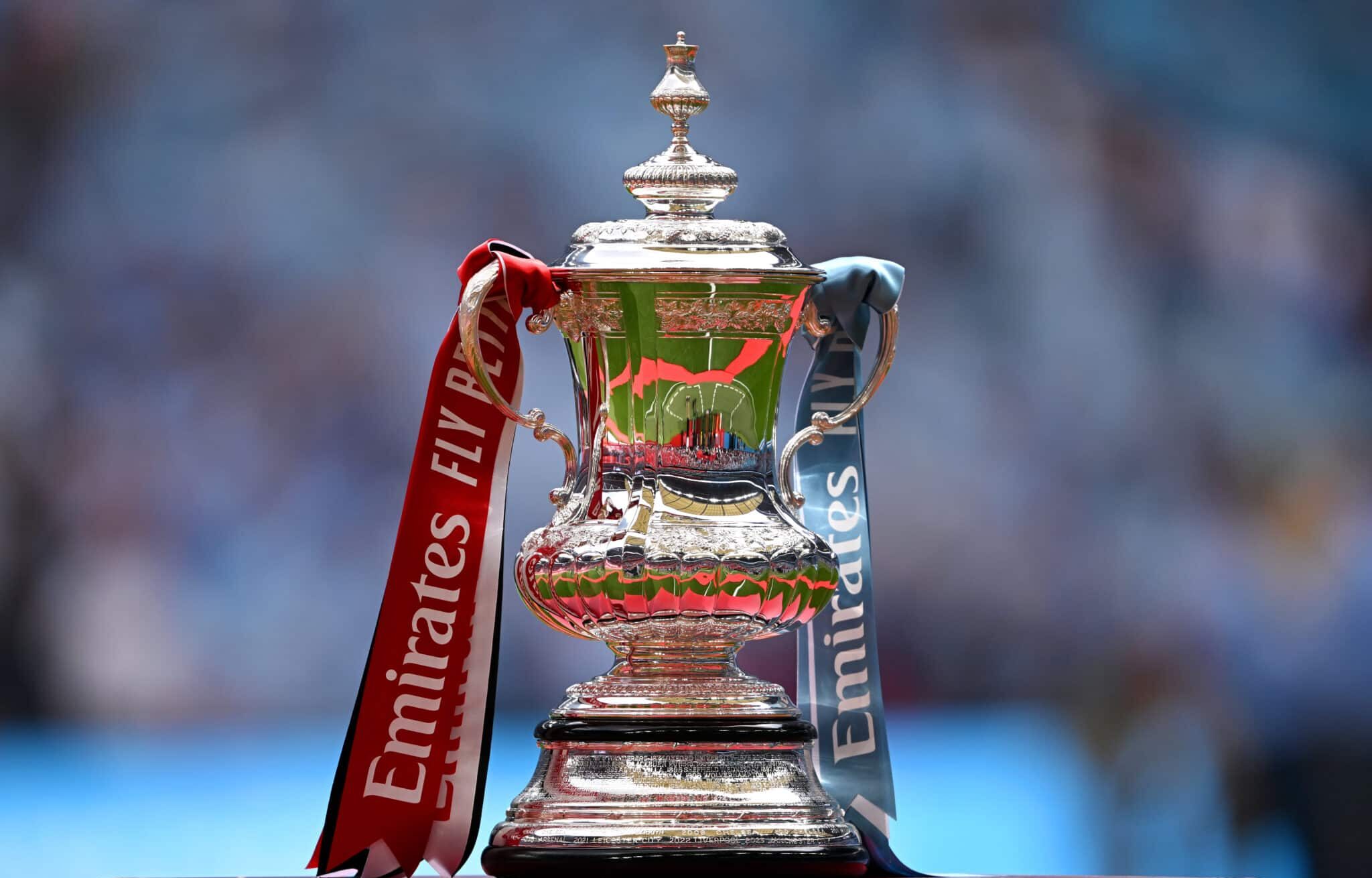 A detailed view as the FA Cup Trophy is displayed on a plinth prior to the Emirates FA Cup Final match between Manchester City and Manchester United at Wembley Stadium on May 25, 2024 in London, England.