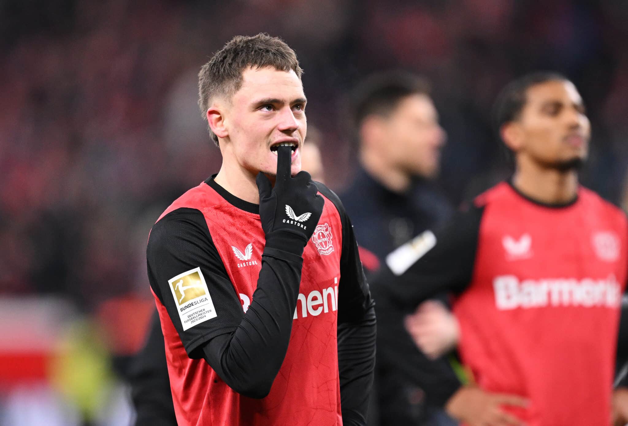 Florian Wirtz of Bayer 04 Leverkusen reacts following the Bundesliga match between Bayer 04 Leverkusen and FC Bayern Munich at BayArena on February 15, 2025 in Leverkusen, Germany.