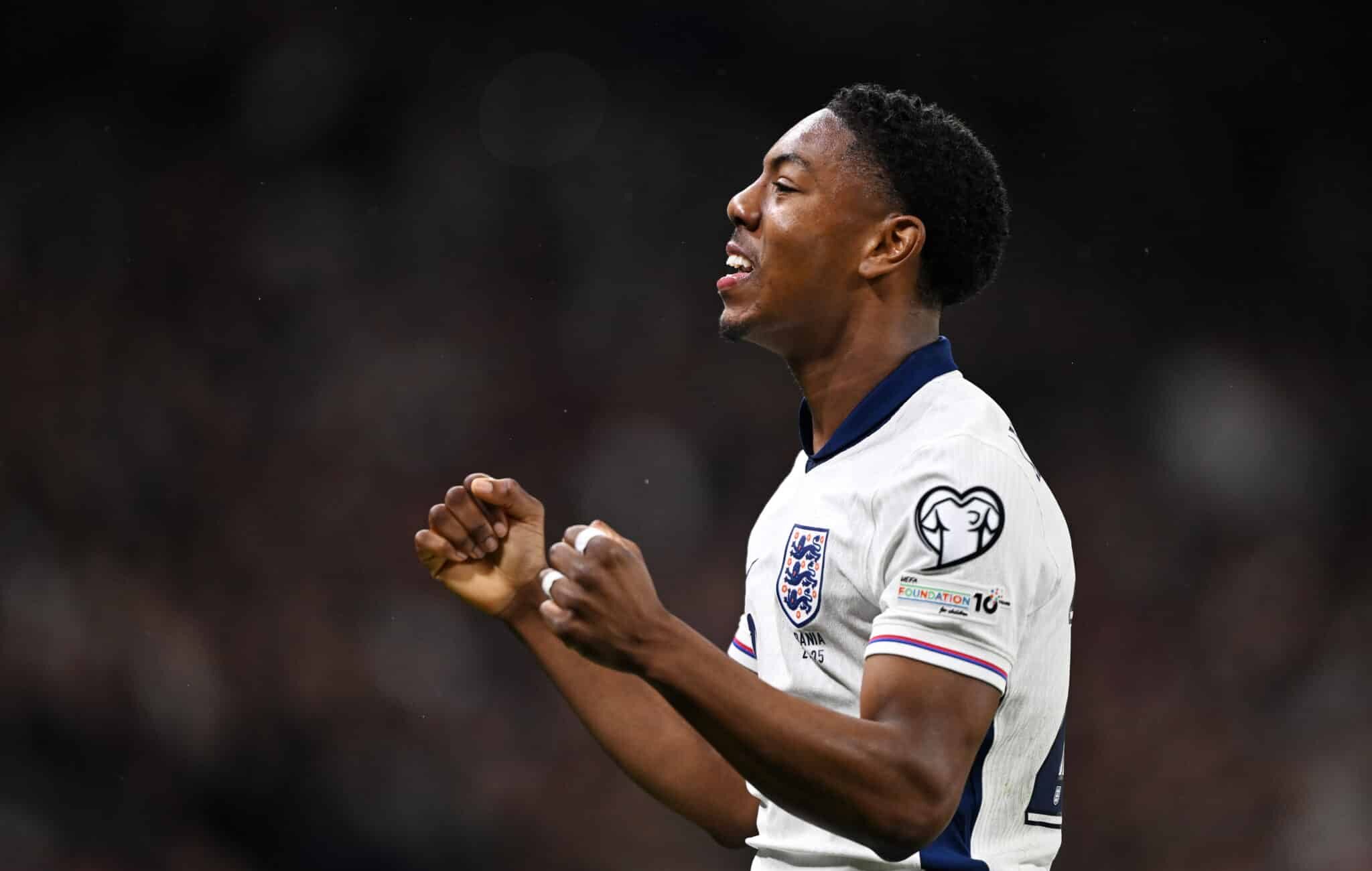 England debutant Myles Lewis-Skelly celebrates scoring his team's first goal during the FIFA World Cup 2026 European Qualifier between England and Albania at Wembley Stadium on March 21, 2025 in London, England.