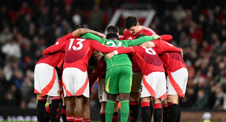 Man Utd players huddle prior to the Premier League match between Man United FC and Ipswich Town FC at Old Trafford on February 26, 2025 in Manchester, England.