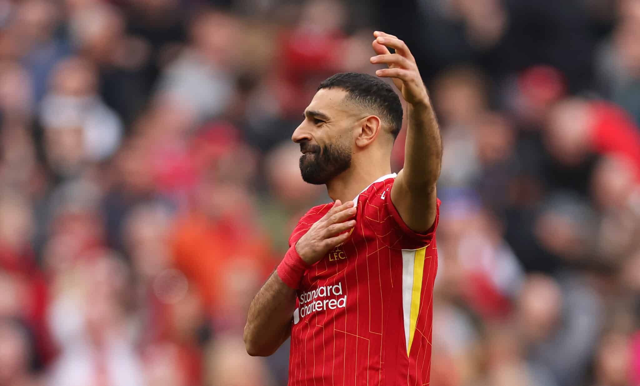Mo Salah of Liverpool celebrates scoring his team's third goal during the Premier League match between Liverpool FC and Southampton FC at Anfield on March 08, 2025 in Liverpool, England.