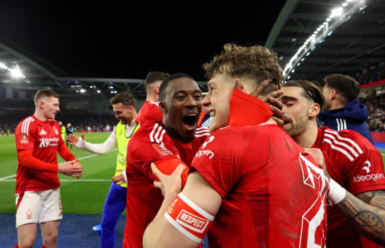 Ryan Yates of Nottingham Forest and Callum Hudson-Odoi celebrate following the team's victory in the penalty shoot out during the Emirates FA Cup Quarter Final match between Brighton & Hove Albion and Nottingham Forest at Amex Stadium on March 29, 2025 in Brighton, England.