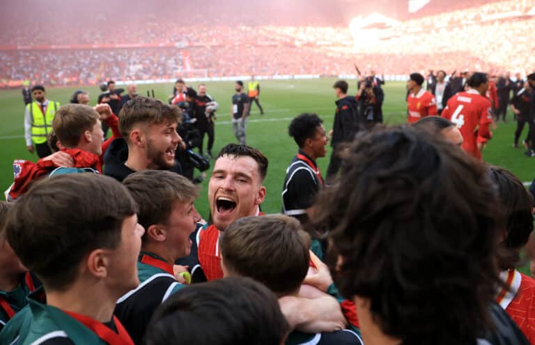Andy Robertson of Liverpool celebrates the teams victory and confirmation of winning the Premier League title after the Premier League match between Liverpool FC and Tottenham Hotspur FC at Anfield on April 27, 2025 in Liverpool, England.