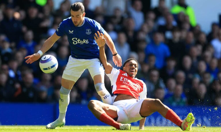 Jack Harrison of Everton clashes with Myles Lewis-Skelly of Arsenal during the Premier League match between Everton FC and Arsenal FC at Goodison Park on April 05, 2025 in Liverpool, England.