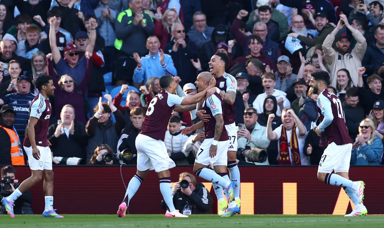 Donyell Malen of Aston Villa celebrates scoring his team's second goal with teammates Youri Tielemans and Morgan Rogers during the Premier League match between Aston Villa FC and Nottingham Forest FC at Villa Park on April 05, 2025 in Birmingham, England.