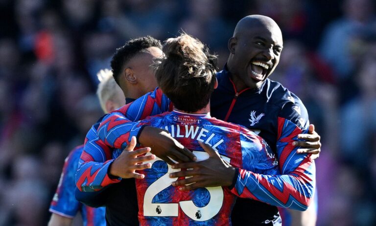 Crystal Palace players Jean-Philippe Mateta and Ben Chilwell celebrate following the team's victory during the Premier League match between Crystal Palace FC and Brighton & Hove Albion FC at Selhurst Park on April 05, 2025 in London, England.