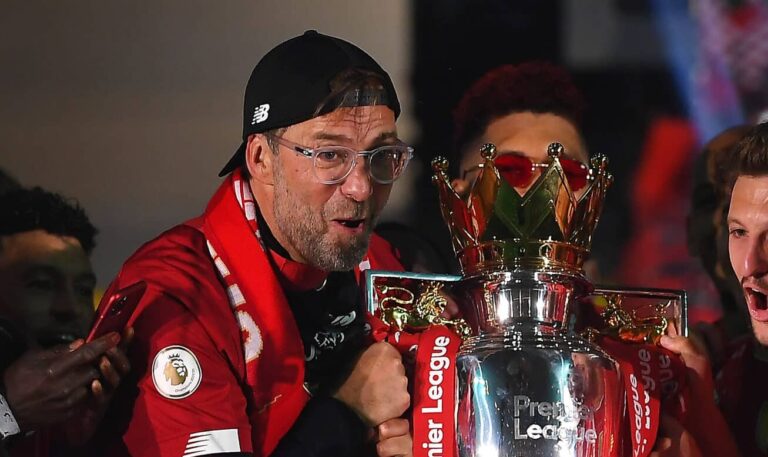Former Liverpool manager Jurgen Klopp holds the Premier League Trophy celebrate winning the League Title during the presentation ceremony of the Premier League match between Liverpool FC and Chelsea FC at Anfield on July 22, 2020 in Liverpool, England.
