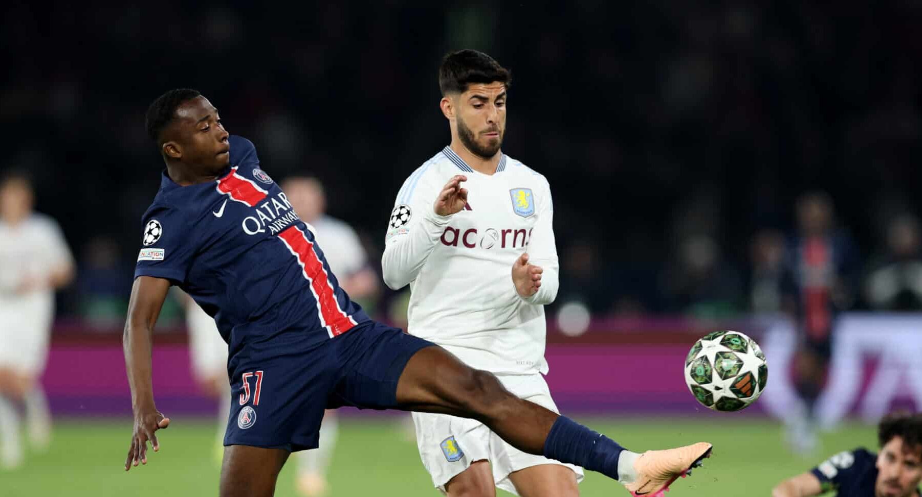 Marco Asensio of Aston Villa challenges for the ball with William Pacho of PSG during the UEFA Champions League 2024/25 Quarter Final First Leg match between Paris Saint-Germain and Aston Villa FC at Parc des Princes on April 09, 2025 in Paris, France.