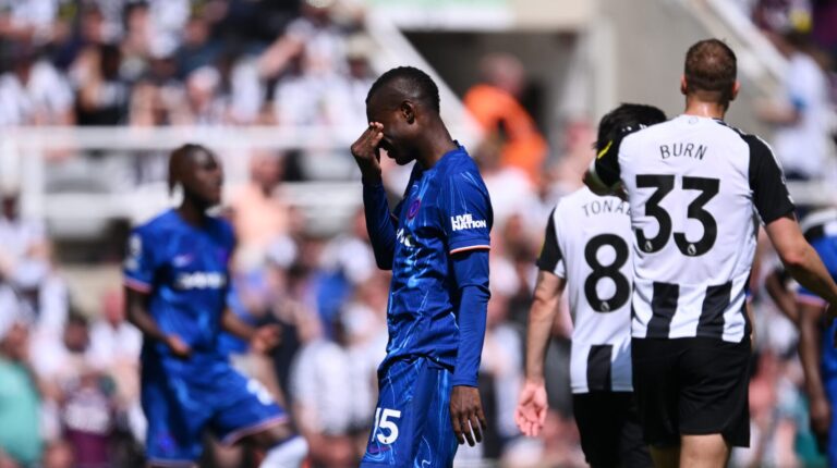 Chelsea striker Nicolas Jackson reacts as he is sent off after being shown a red card for clashing with Sven Botman of Newcastle United (not pictured) during the Premier League match between Newcastle United FC and Chelsea FC at St James' Park on May 11, 2025 in Newcastle upon Tyne, England.