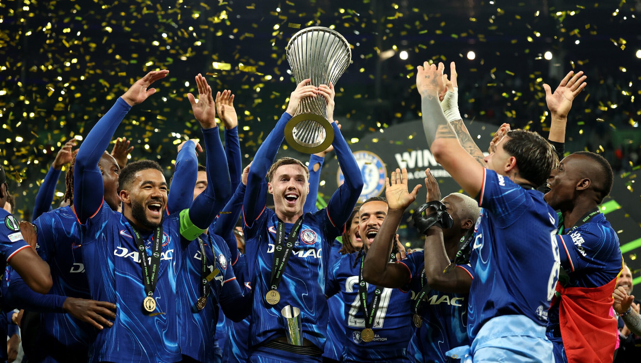 Cole Palmer of Chelsea lifts the UEFA Conference League trophy after his team's victory in the UEFA Conference League Final 2025 between Real Betis Balompie and Chelsea FC at on May 28, 2025 in Wroclaw, Poland.