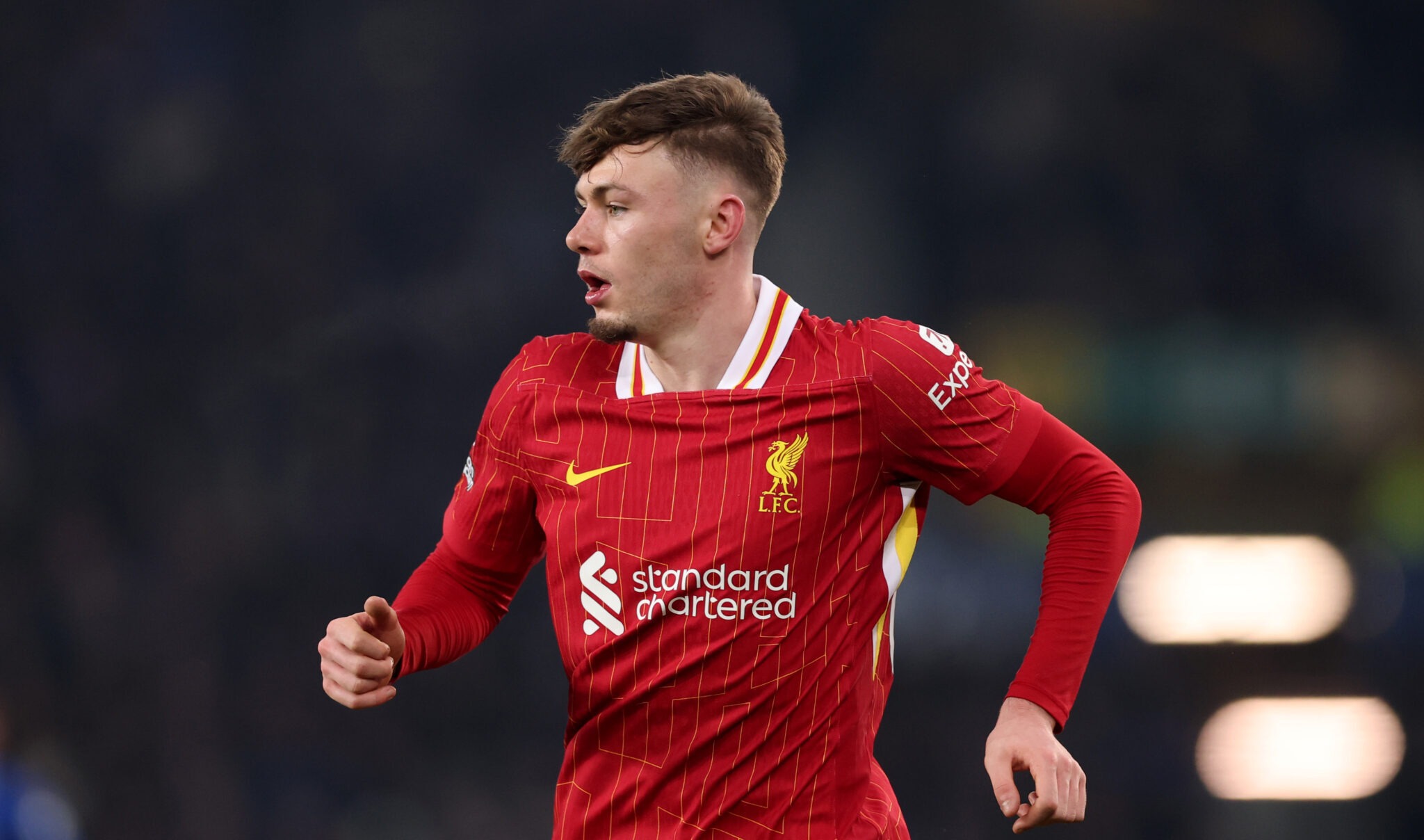 Conor Bradley of Liverpool looks on during the Premier League match between Everton FC and Liverpool FC at Goodison Park on February 12, 2025 in Liverpool, England.