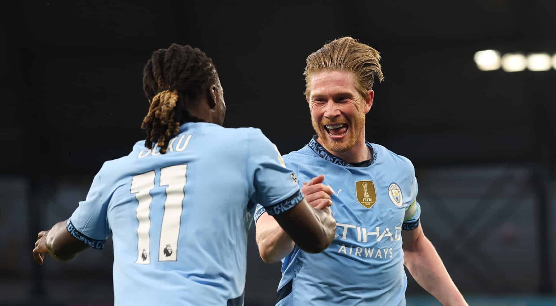 Kevin De Bruyne of Man City celebrates scoring his team's first goal with teammate Jeremy Doku during the Premier League match between Manchester City FC and Wolverhampton Wanderers FC at Etihad Stadium on May 02, 2025 in Manchester, England.
