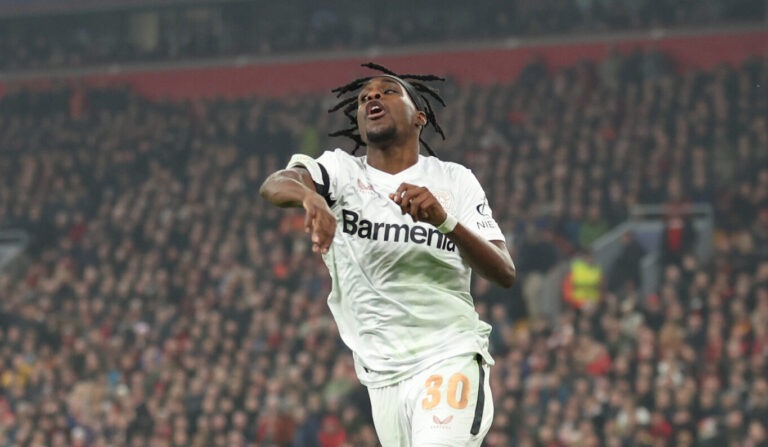 Jeremie Frimpong of Bayer 04 Leverkusen reacts after a goal is disallowed due to handball during the UEFA Champions League 2024/25 League Phase MD4 match between Liverpool FC and Bayer 04 Leverkusen at Anfield on November 05, 2024 in Liverpool, England.