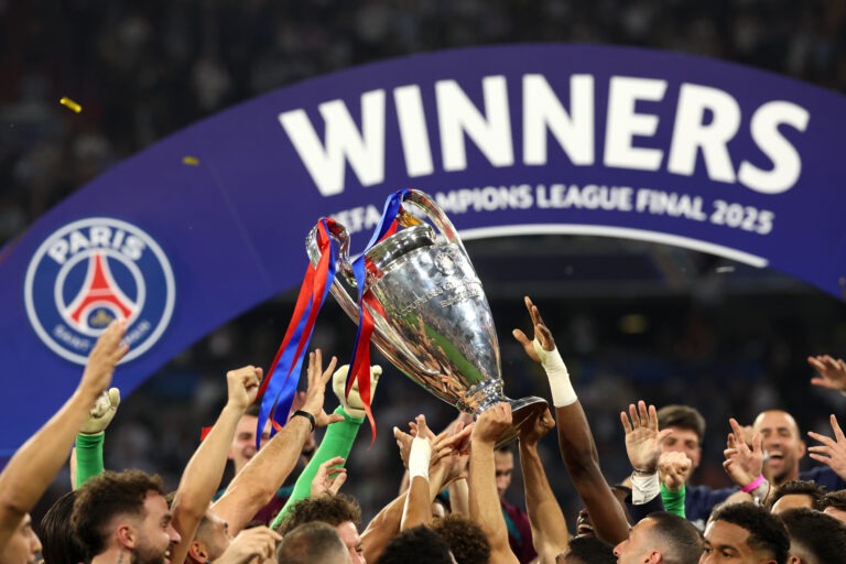 Champions League - Players of Paris Saint-Germain celebrate with the UEFA Champions League trophy after their team's victory, to secure Paris Saint-Germain's first ever UEFA Champions League title in the club's history and a record UEFA Champions League Final winning scoreline of 5-0, following the UEFA Champions League Final 2025 between Paris Saint-Germain and FC Internazionale Milano at Munich Football Arena on May 31, 2025 in Munich, Germany.