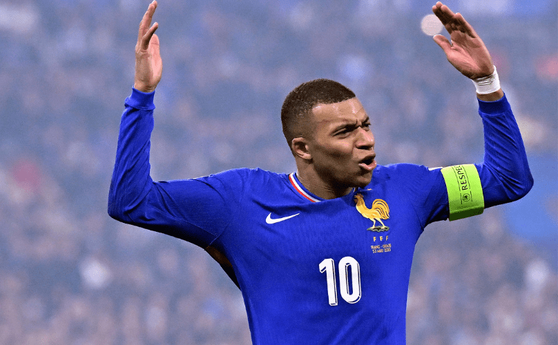 France forward Kylian Mbappe gestures during a match.