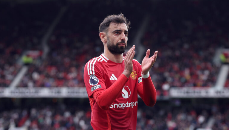 Bruno Fernandes of Man Utd applauds their support during the Premier League match between Manchester United FC and Aston Villa FC at Old Trafford on May 25, 2025 in Manchester, England.