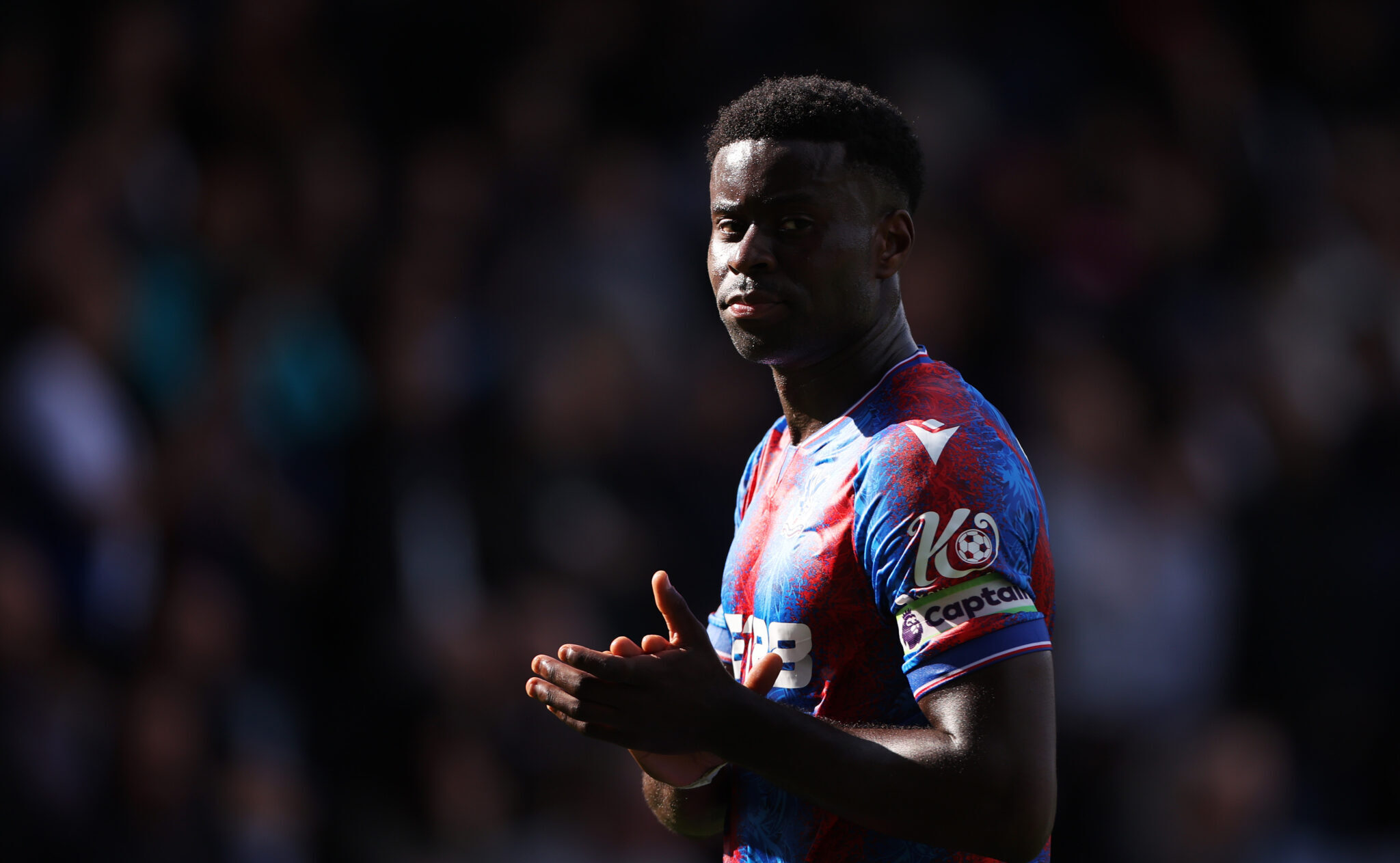 Liverpool transfer target Marc Guehi of Crystal Palace applauds the fans following the team's defeat during the Premier League match between Crystal Palace FC and Liverpool FC at Selhurst Park on October 05, 2024 in London, England.