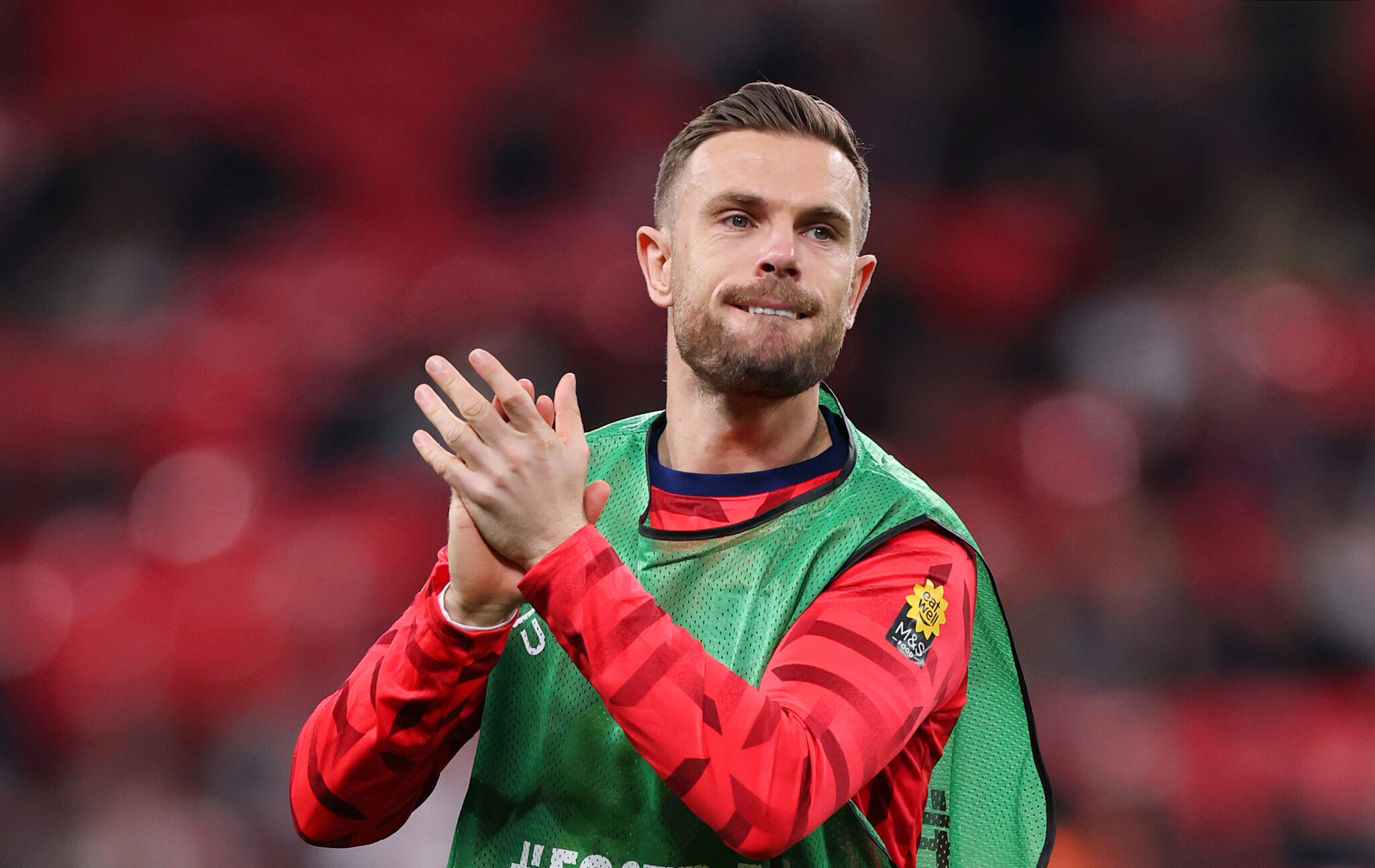 Jordan Henderson of England applauds the fans as he warms up prior to the FIFA World Cup 2026 European Qualifier between England and Albania at Wembley Stadium on March 21, 2025 in London, England.