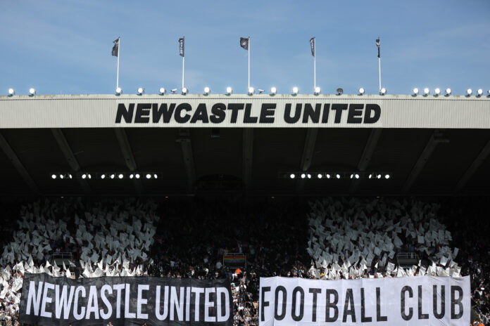 Newcastle United fans show their support with banners and flags prior to the Premier League match between Newcastle United and Brighton & Hove Albion at St. James Park on May 11, 2024 in Newcastle upon Tyne, England.