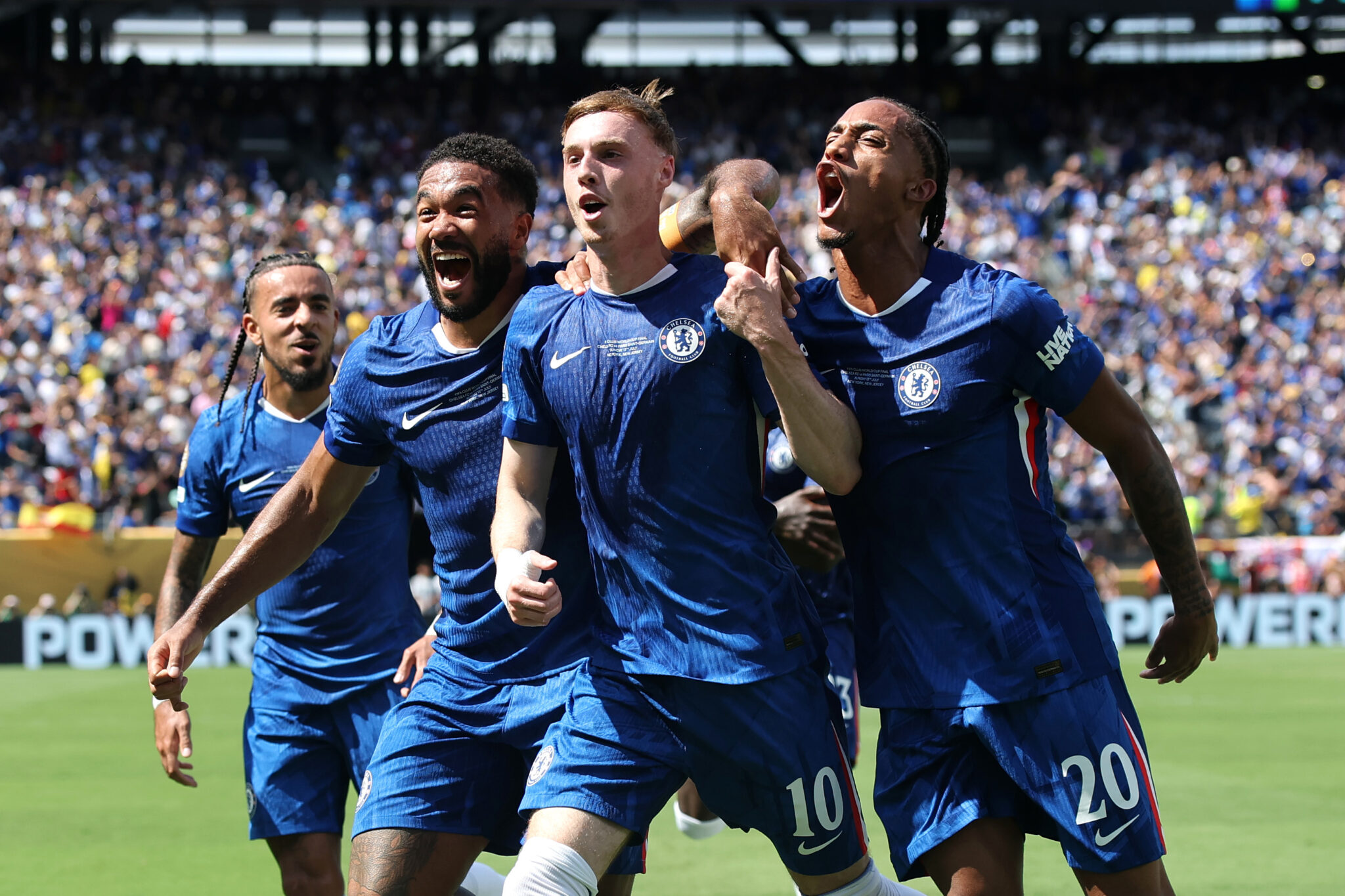 Chelsea players celebrate a goal.