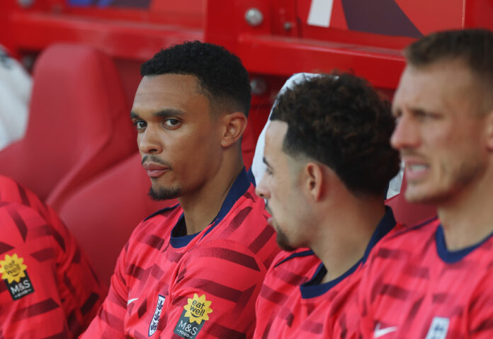 Trent Alexander-Arnold of England looks on, while sitting on the substitutes bench during the international friendly match between England and Senegal at City Ground on June 10, 2025 in Nottingham, England.