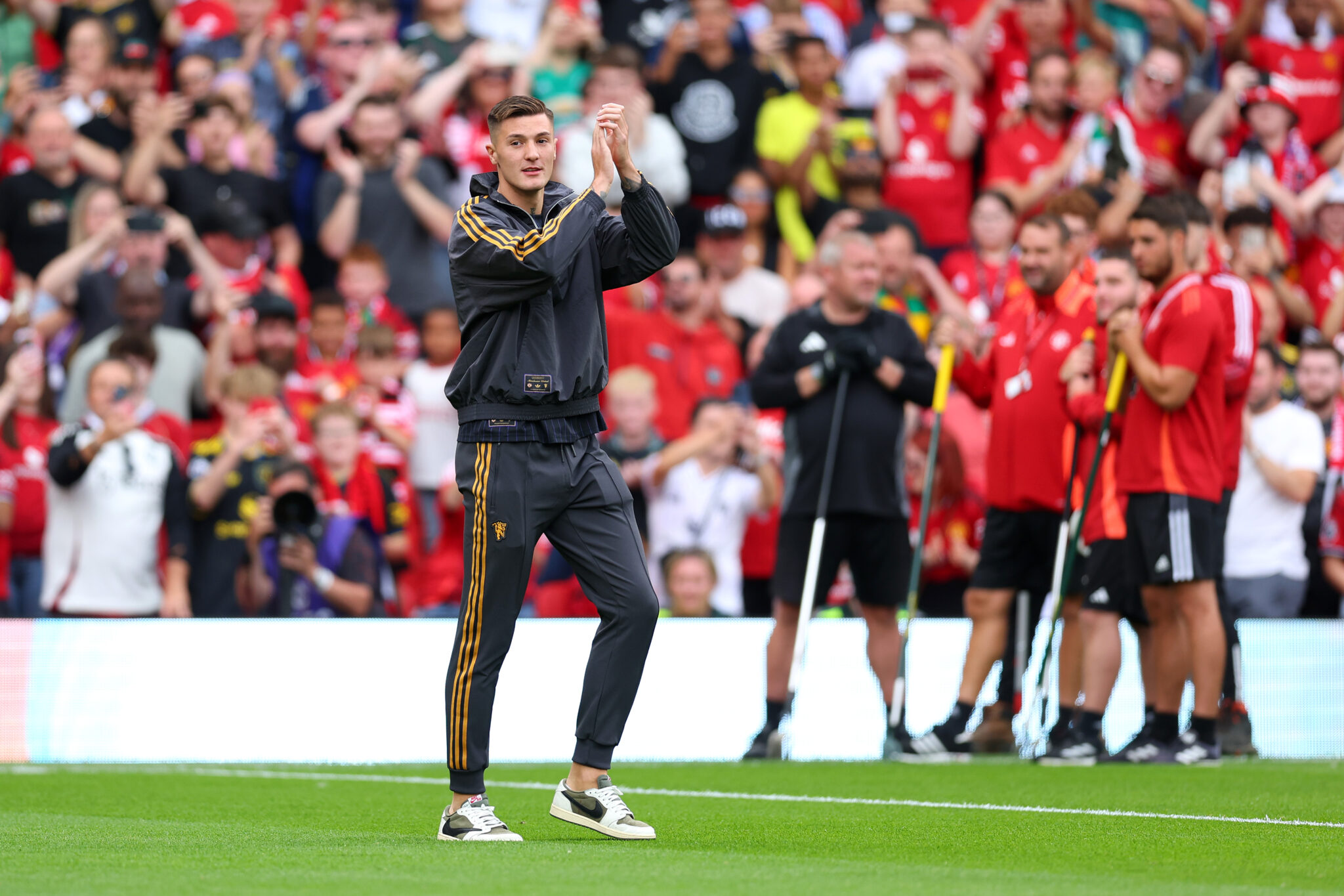 Benjamin Sesko of Man Utd acknowledges the fans, as he is unveiled to the fans after signing for the team, prior to the pre-season friendly match between Manchester United and ACF Fiorentina at Old Trafford on August 09, 2025 in Manchester, England.