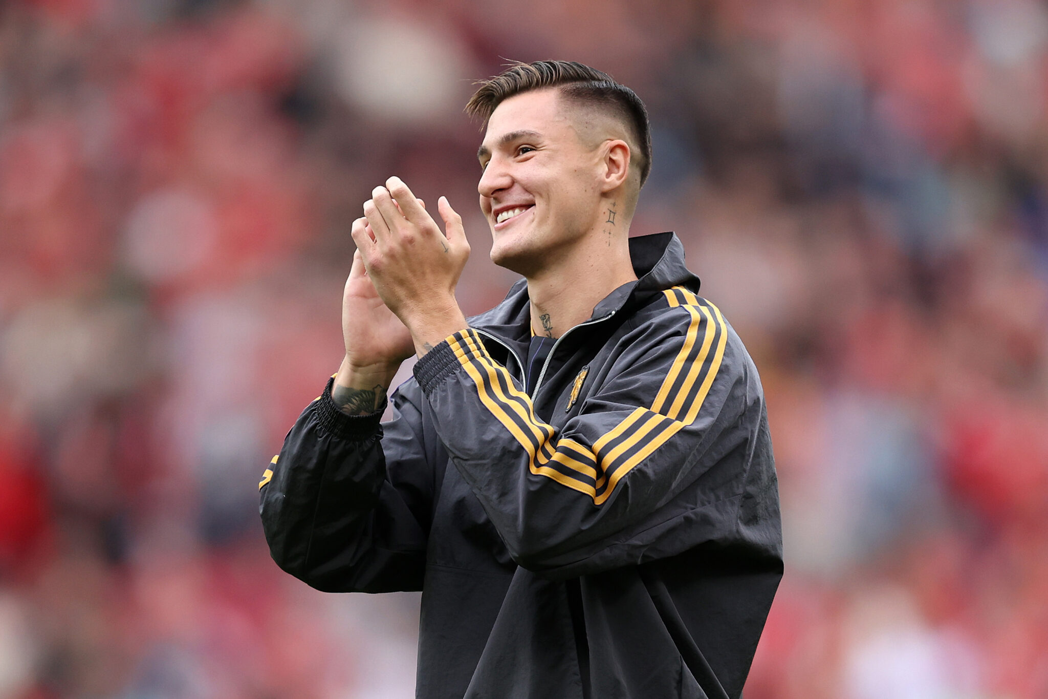 Benjamin Sesko of Man Utd acknowledges the fans, as he is unveiled to the fans after signing for the team, prior to the pre-season friendly match between Manchester United and ACF Fiorentina at Old Trafford on August 09, 2025 in Manchester, England. 