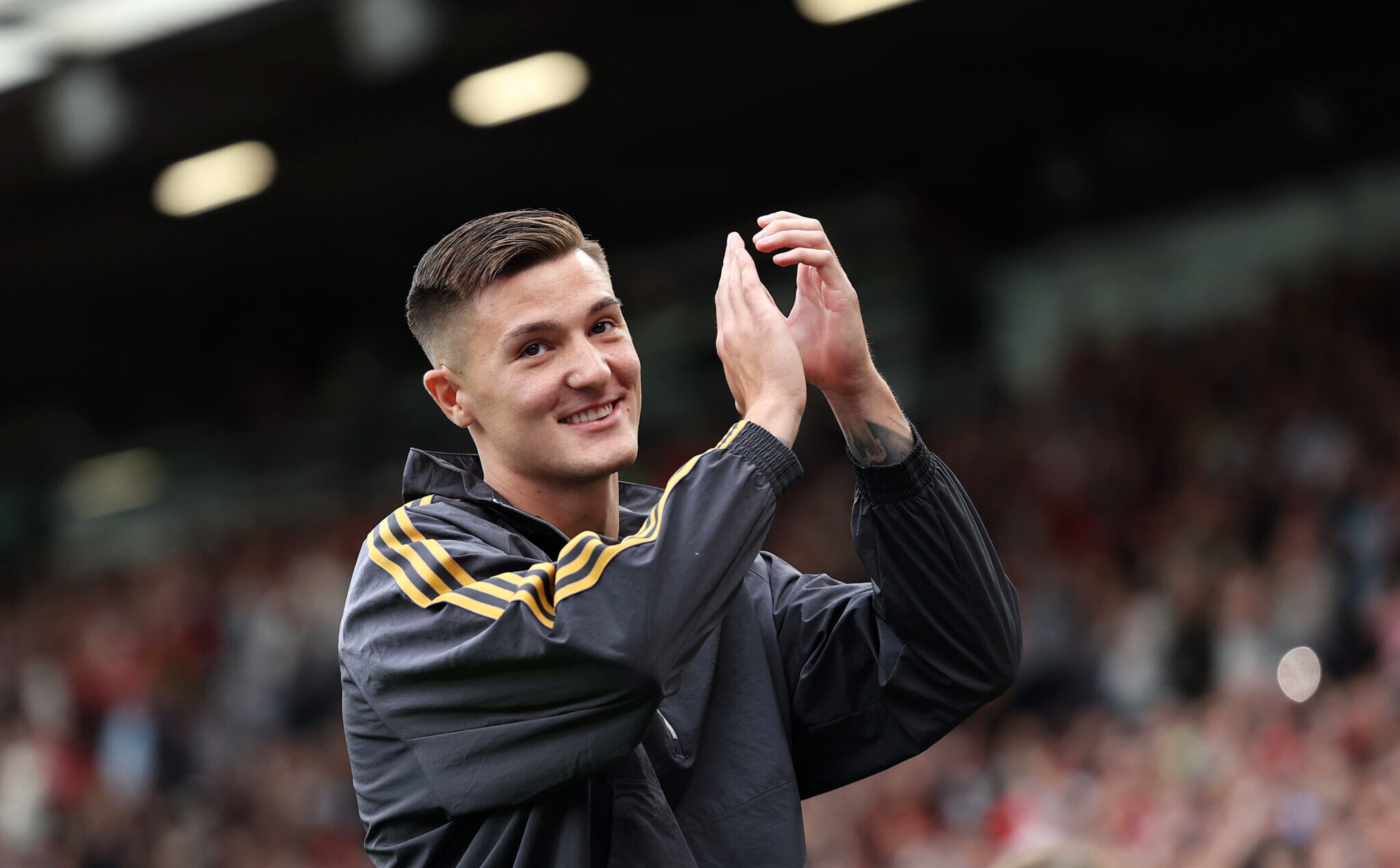 Benjamin Sesko of Man Utd acknowledges the fans, as he is unveiled to the fans after signing for the team, prior to the pre-season friendly match between Manchester United and ACF Fiorentina at Old Trafford on August 09, 2025 in Manchester, England.