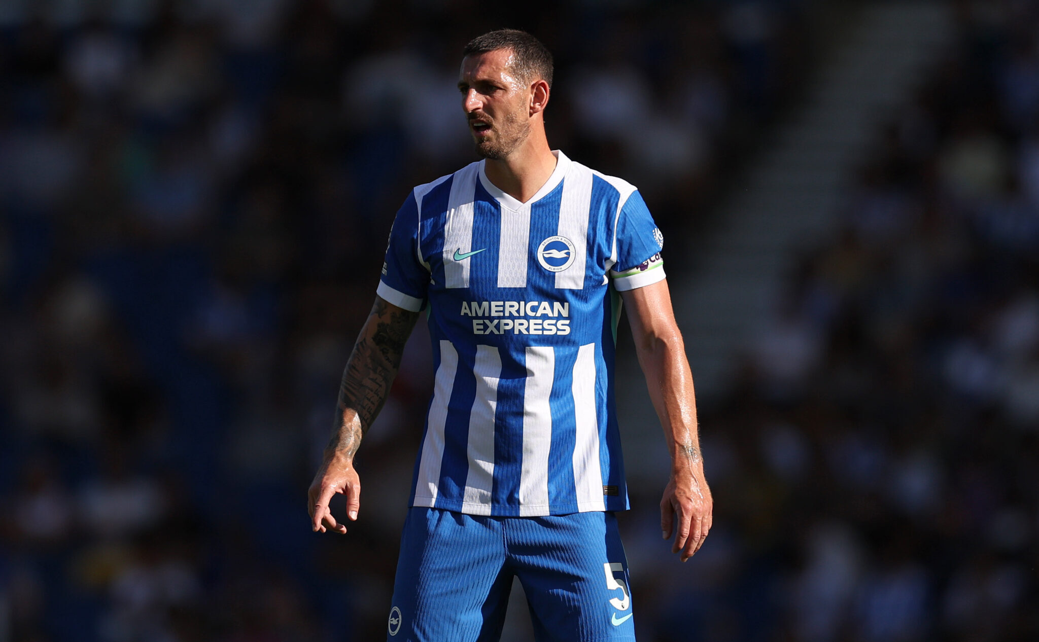 Lewis Dunk of Brighton & Hove Albion during the pre-season friendly match between Brighton & Hove Albion and VfL Wolfsburg at Amex Stadium on August 09, 2025 in Brighton, England.